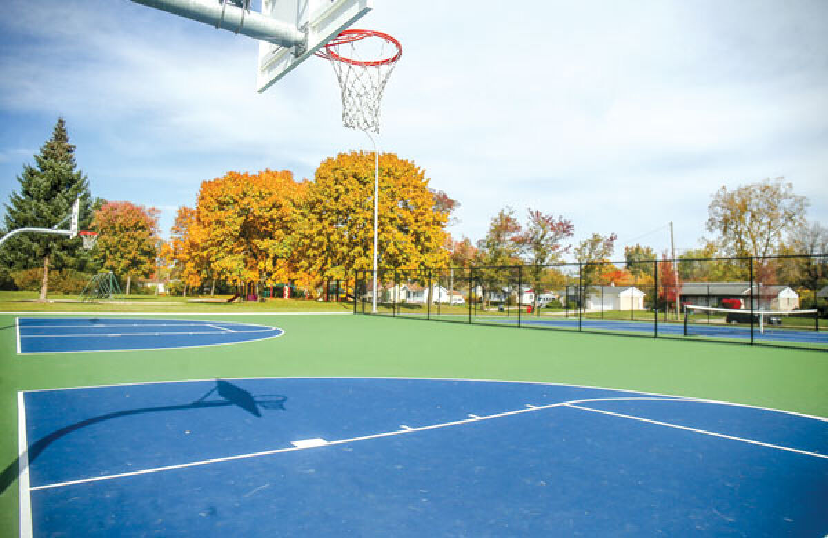  Two half-courts for basketball at Simms Park were recently added. 
