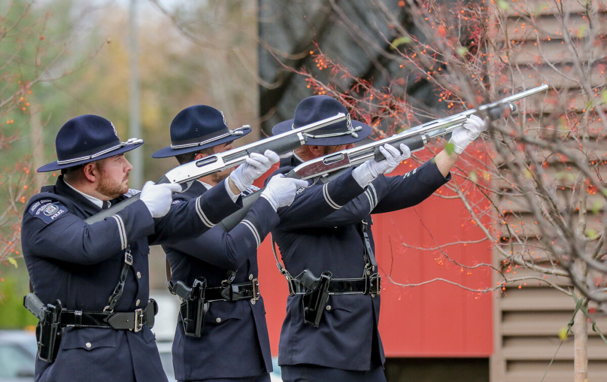  The Sterling Heights Police Honor Guard performs a 21-gun salute at a previous Veterans Day ceremony in Sterling Heights.   