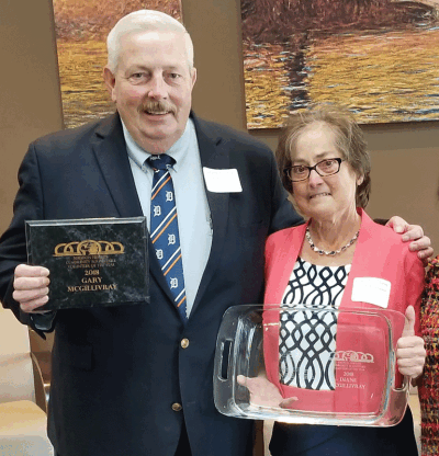   At the 2018 awards luncheon for the Madison Heights Community Round Table, Oakland County Commissioner Gary McGillivray and his wife Diane received MHCRT Volunteer of the Year awards.  