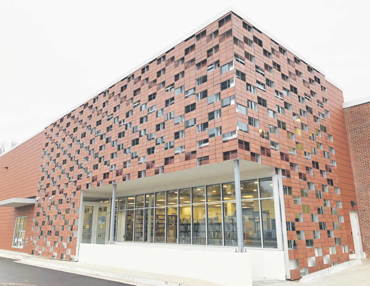  A terracotta sun screen and rain screen wraps around the addition to the Central Branch of the Grosse Pointe Public Library in Grosse Pointe Farms. 