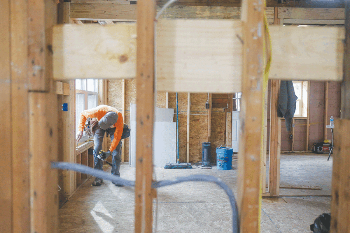  Habitat Oakland crews work on a “total rehab” of a home on Westover. Bank of America donated $3.1 million towards Global Build this year  as part of its three-year commitment to Habitat. Habitat Oakland was presented with $40,000 to renovate homes in Oakland County. 