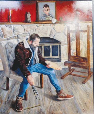  Reni Stephan’s self-portrait is on display in his art studio, Studio Lamassu. 