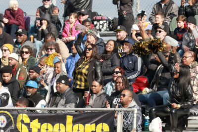  Berkley Steelers fans cheer on the team during the game. 