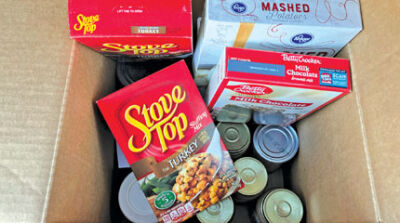  Thanksgiving meal boxes distributed to refugee families by Samaritas included items such as a turkey, stuffing, mashed potatoes and dessert. 