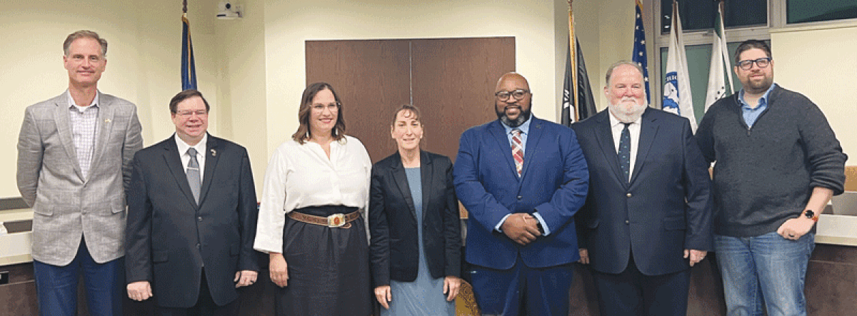  Madison Heights Mayor Roslyn Grafstein, center, is flanked by council members David Soltis, Sean Fleming and Emily Rohrbach on the left, and Quinn Wright, Bill Mier and Mark Bliss on the right. The new council was sworn in Nov. 16, with Mier being a new addition. Fleming and Wright were previously appointed and won four-year terms in the Nov. 7 election. 