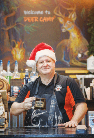   Beverage crafter Anthony Majewski serves up specialty coffee made from beans roasted on-site at DEER CAMP Coffee  Roasting Co. & Outfitters  in Sterling Heights. 