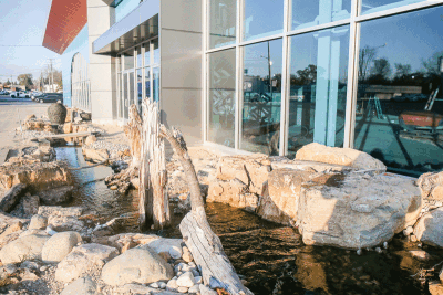  Guests will pass over bridges and a koi pond to enter the LegaSea Aquarium. 