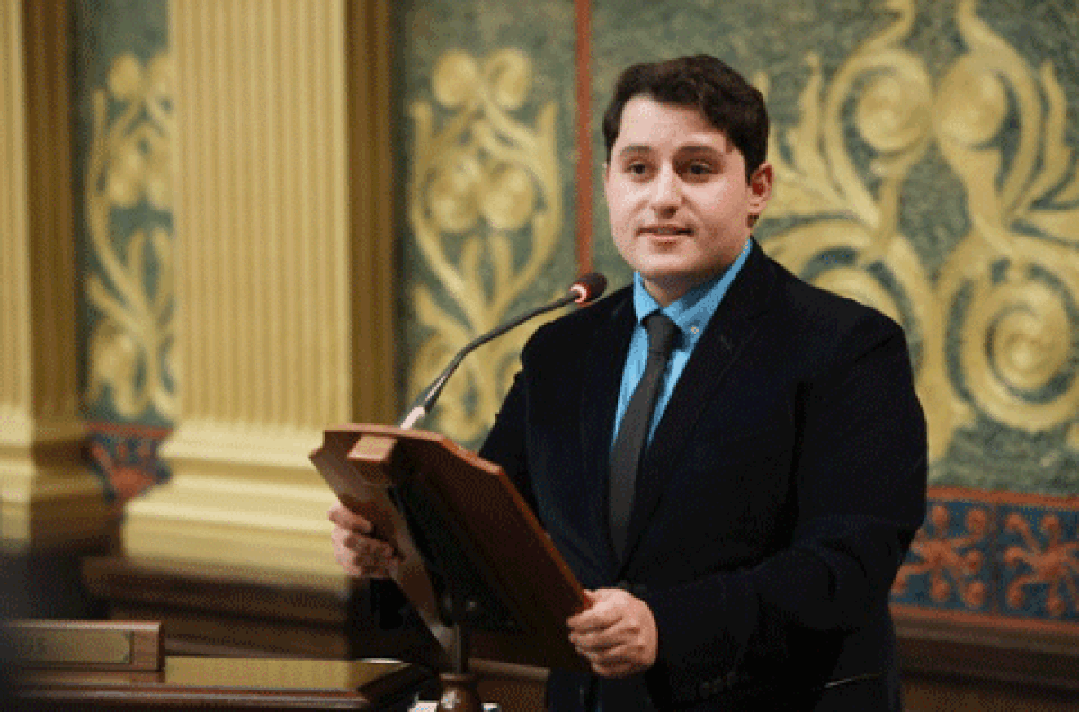  State Rep. Noah Arbit speaks in favor of the Institutional Desecration Act on the House floor on June 20, at the state Capitol in Lansing. Gov. Gretchen Whitmer signed the bills into law on Dec. 11. 