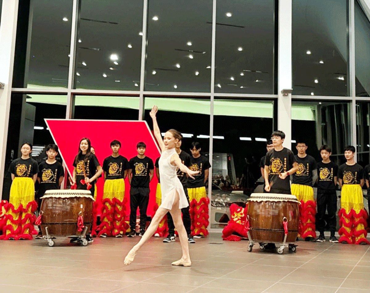  The Michigan Lion Dance Team combined traditional Chinese music and dance with western elements such as ballet, pictured, to produce a multicultural holiday celebration. 