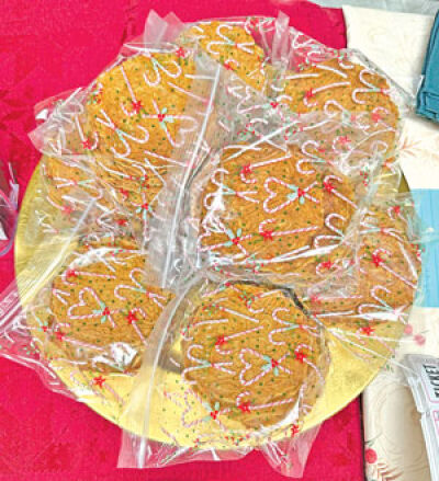  Lukken sit on a tray for a bake sale. 