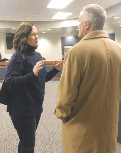  Jennifer Nitz, left, was named to the Warren Woods Public Schools Board of Education meeting Dec. 11. Board member Mike Fitzpatrick, right, made the motion to appoint her to the board.  