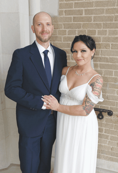  Julia Frueh and her husband, Jason, get married at Grace Centers of Hope’s church in November. Frueh says the GCH program also inspired her to get married to Jason. After spending several months recovering from substance abuse and trauma at GCH, Frueh says she is starting to rebuild ties  with her parents, as well as her husband’s family. 