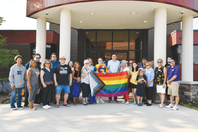  Sterling Heights Mayor Michael Taylor and city officials attend a Pride flag raising ceremony in June with the Sterling Heights CommUNITY Alliance. 