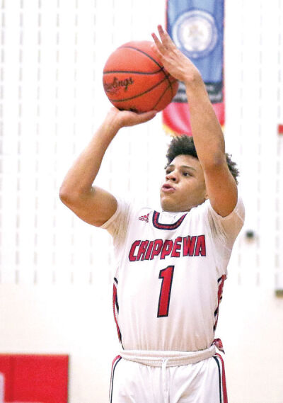  Chippewa Valley sophomore Joshua Johnson shoots the ball during a matchup against Warren De La Salle on Dec. 8 at Chippewa Valley High School. 