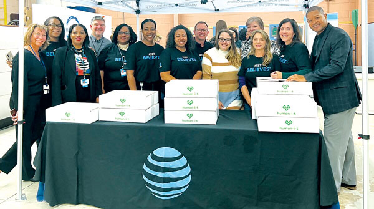  Disability Network Eastern Michigan distributed 50 laptops donated by AT&T and Human I-T to its clients Dec. 4. 