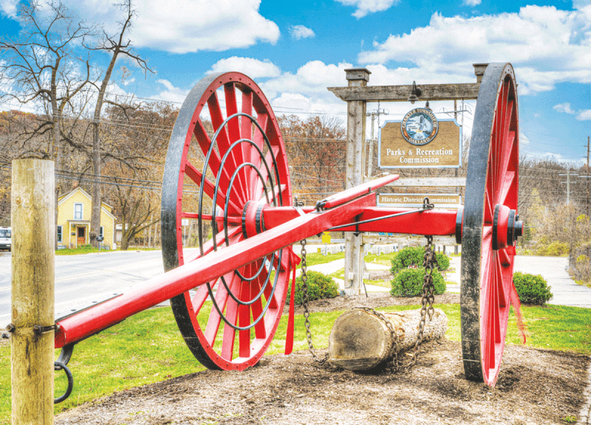  Oakland Township’s historic big red logging wheels have been restored. 