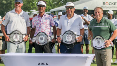  The team of, from left, Matt Kuchar, Joe Hooks, Peter Ginopolis and Tom Izzo sport the championship belts after taking first place in the 313 Celebrity Scramble July 26 at Detroit Golf Club. 