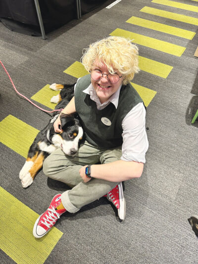  The Birmingham police therapy dog Maple and Baldwin teen assistant Sinjin Green  attend a recent after hours Exam Cram for Teens.  