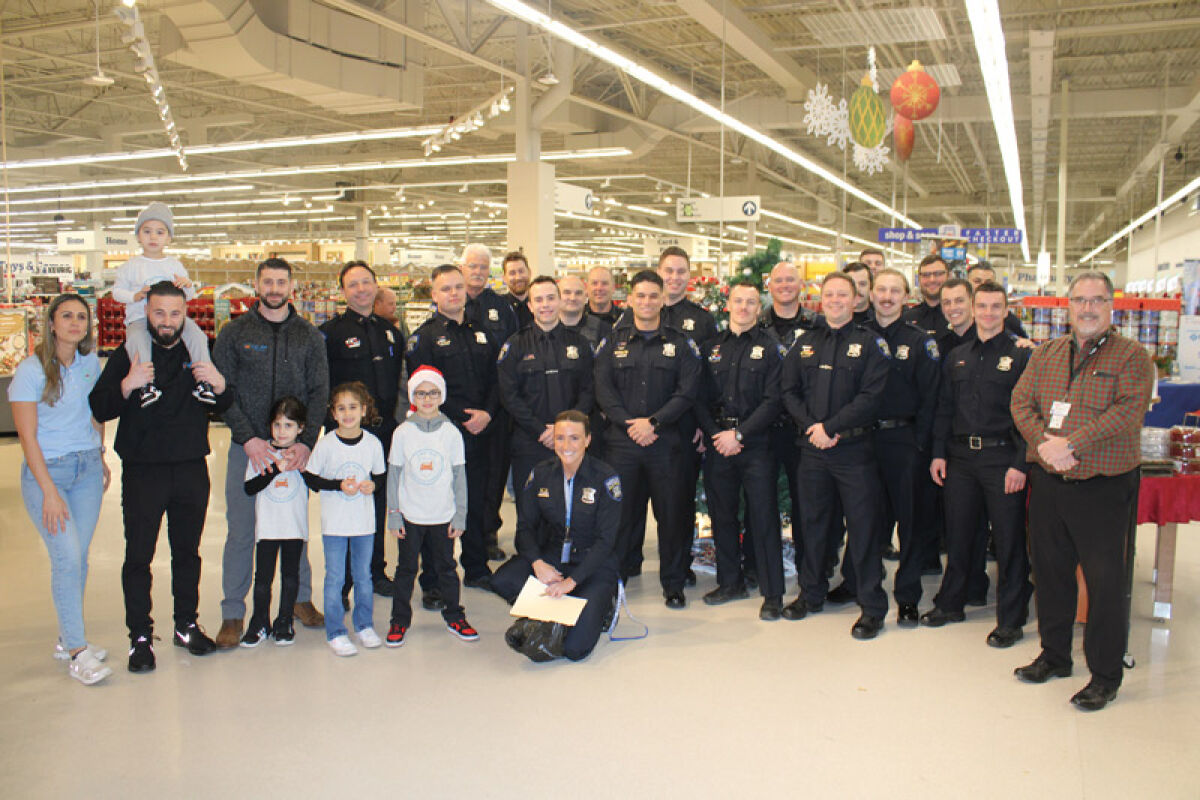  The Shelby Township Police Department’s Shop with a Cop event took place on Dec. 5 at Meijer in Shelby Township. This year the program was able to provide gifts and food baskets for more  than 35 children  and 17 families. 