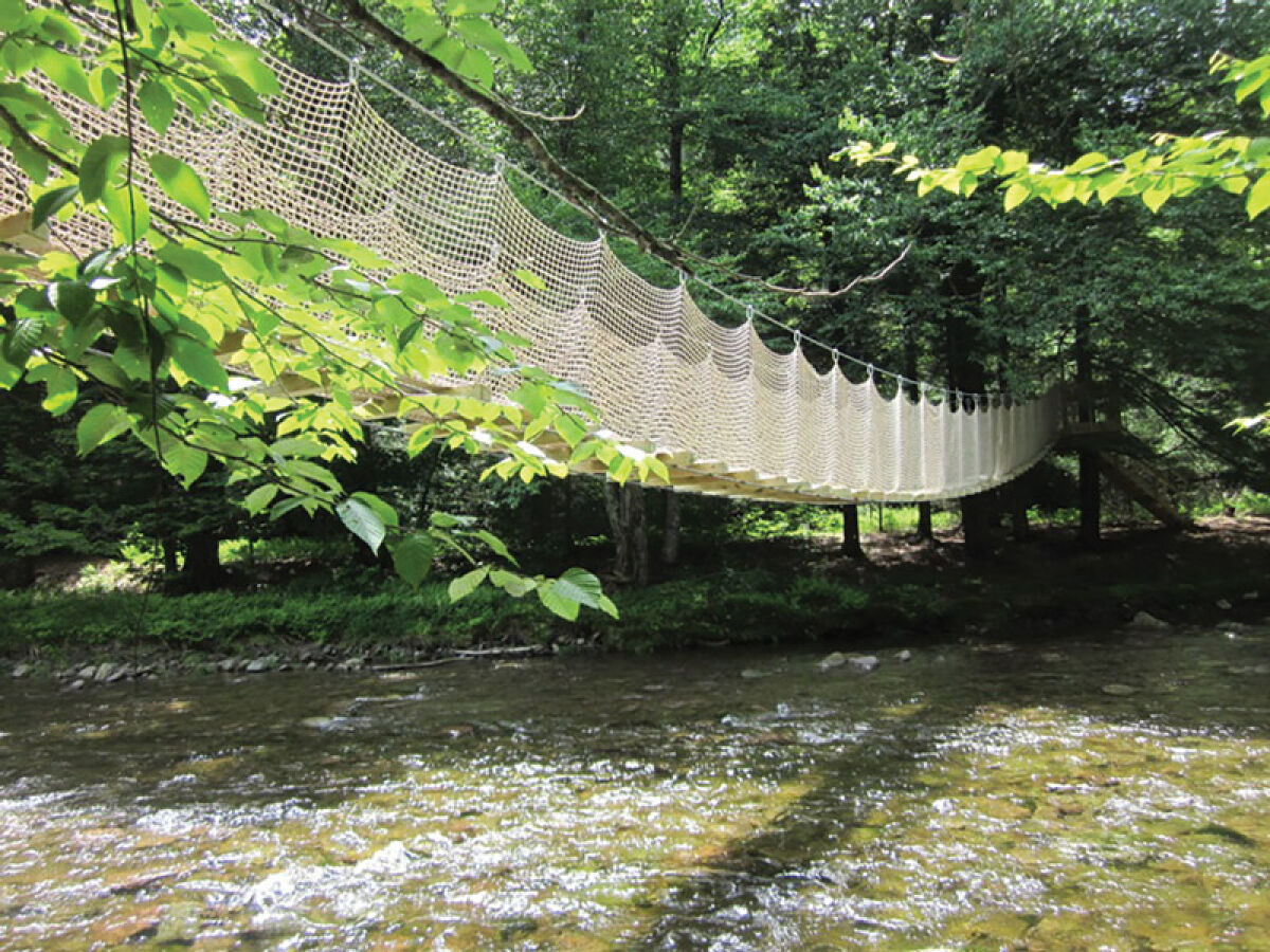  The city of Rochester Hills plans to begin construction on what Mayor Bryan Barnett has called an “Indiana Jones rope-style bridge,” similar to this one, in 2024. 