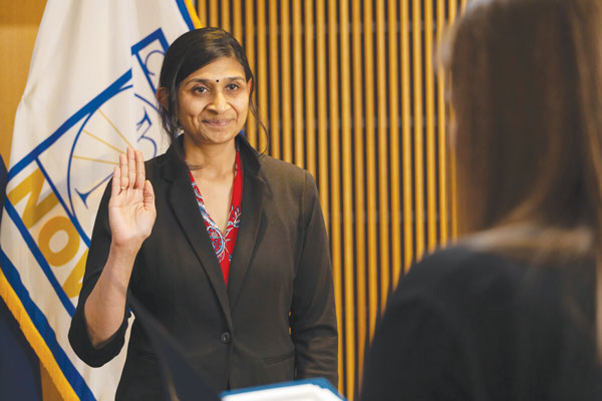  New Novi City Council member Priya Gurumurthy takes the oath of office after the council selected her to fill an open seat Dec. 18. 