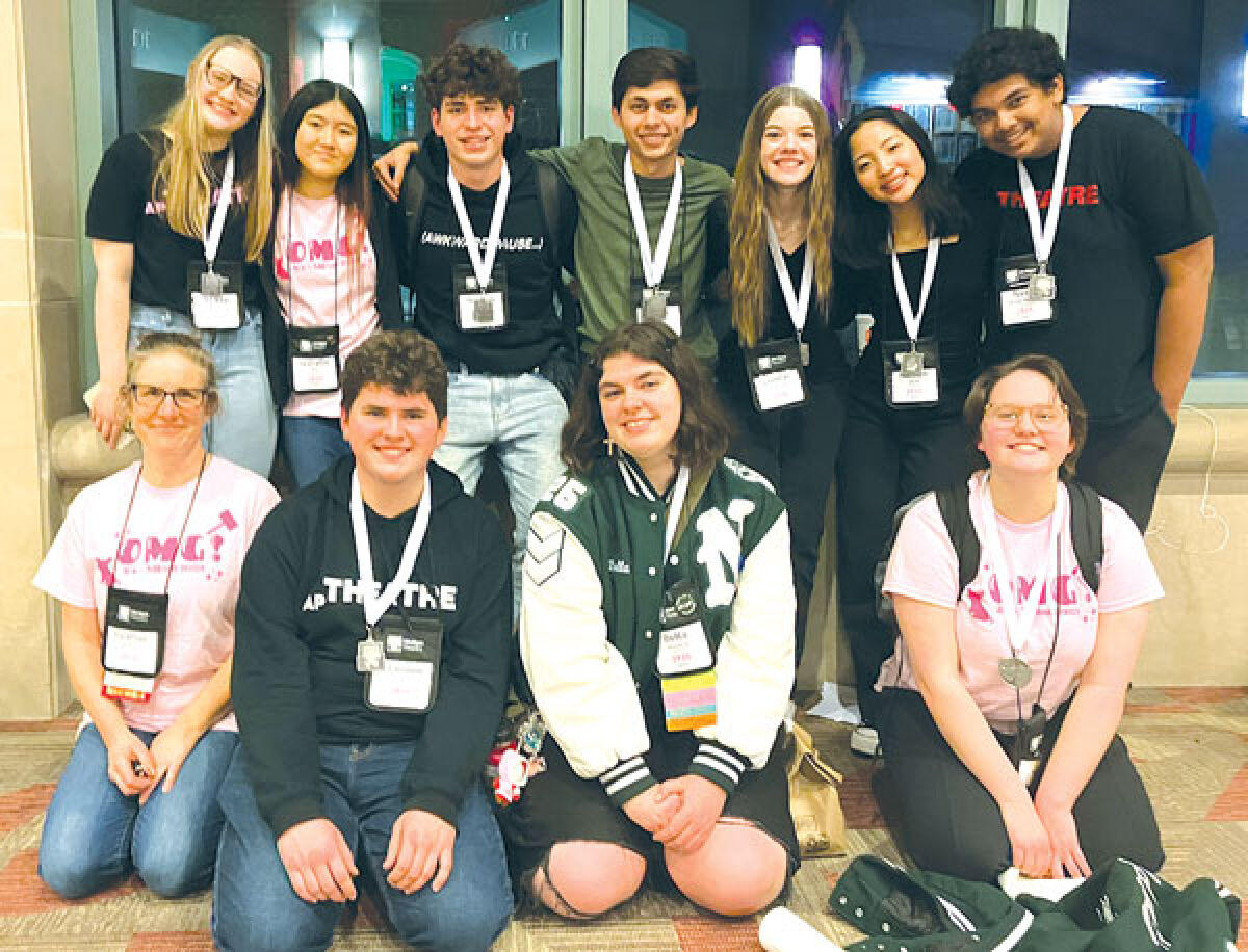  Novi theater students pose with their teacher at the annual Michigan Thespian Festival in Lansing last month. Pictured in the second row, from the left, are Alyssa Kraus, Isabelle Shi, Thomas Smith, Milan Thurman, Lorelai Raudszus, Hanna Jeong and Neel Archis-Manish. Pictured in the first row, from the left, are Novi High School Theater Director Heather McKaig, and students Brandon Gilger, Bella Houchins and Katey Kumon. 
