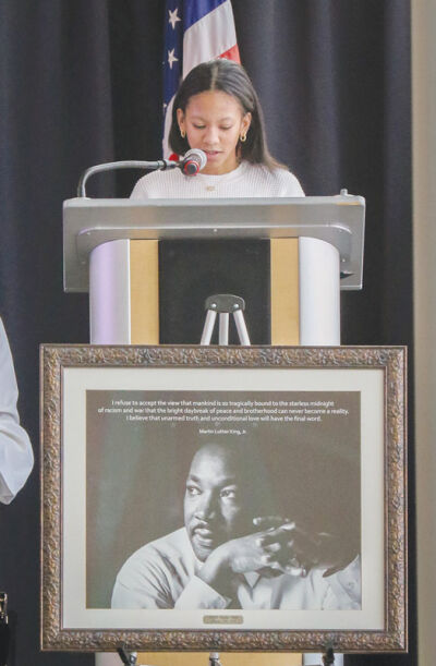  Spoken word artist Alexis Hurley gives an inspiring speech about  the Rev. Martin Luther King Jr. on Jan.15 at Warren City Hall.   