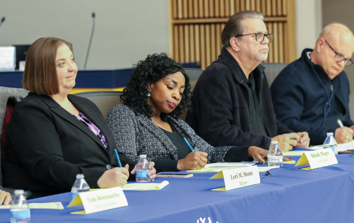  Warren Mayor Lori Stone, left, and City Council members Melody Magee, Gary Boike and Henry Newnan listen to residents and take notes at the first “listening tour” event Jan.10 at the Fitzgerald Public Schools Neigebaur Administration Building. 