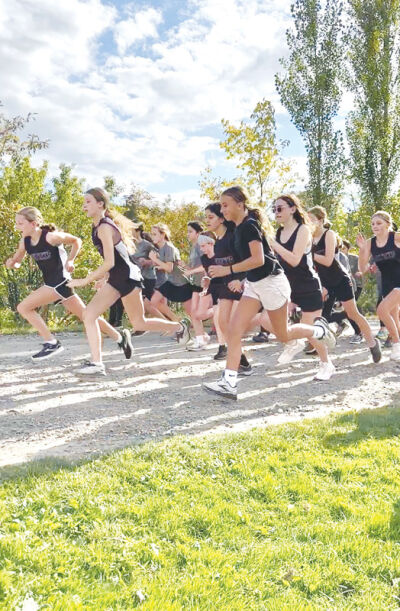   Middle school students in the Bloomfield Hills Public School district take off during a  cross country race, which is a no-cut sport.  