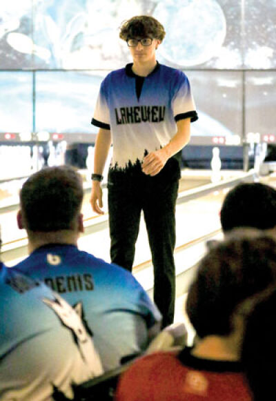  Lakeview junior Josh Ciegotura walks back to his teammates during the Macomb County Bowling Championships on Jan. 13 at 5 Star Lanes. 