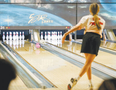  Mazza follows through on a shot at the Macomb County Bowling Championships Jan. 13 at 5 Star Lanes in Sterling Heights. 