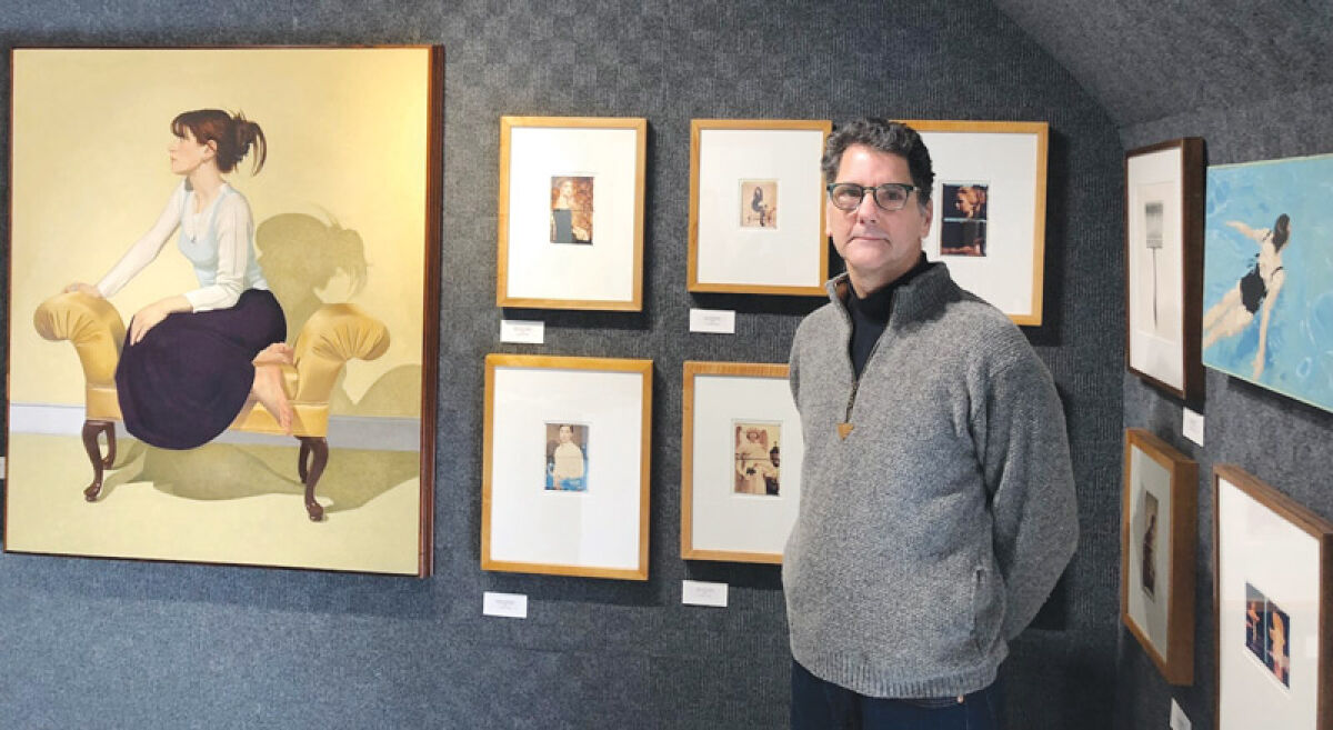  Robert Kolinski — who won top honors in last year’s Art Takeover in The Village — is shown here with some of his works, which are on display through Jan. 31 at Posterity Art & Framing Gallery in Grosse Pointe City.  