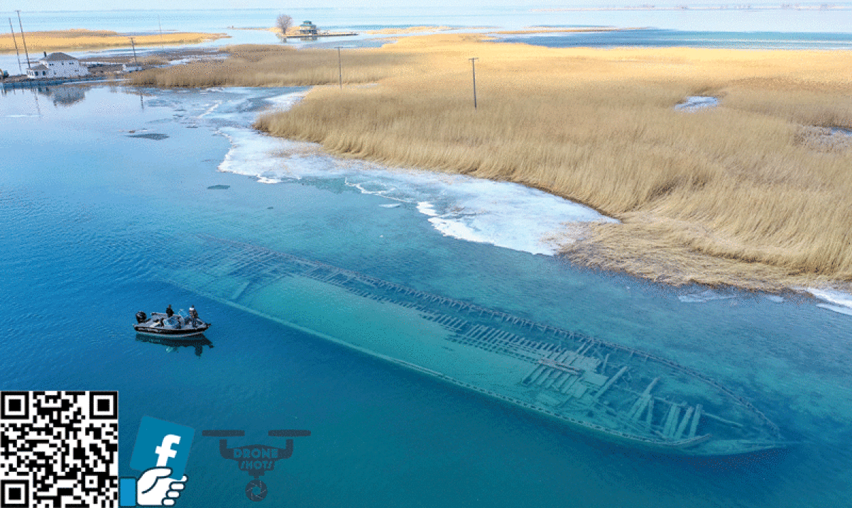  A boater stops to view the Harlow Loran shipwreck in the Middle Channel.  