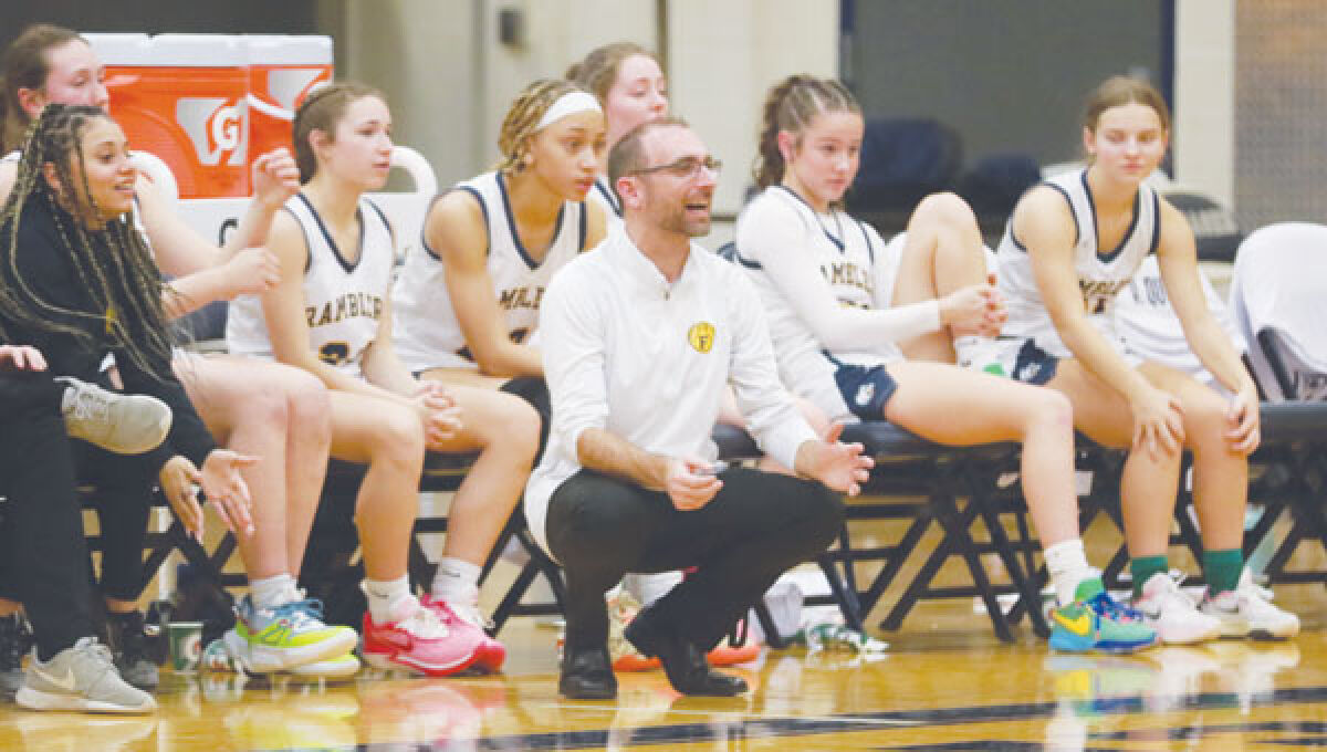  Fraser coach Robert Fulgenzi gives his team some words of encouragement during their 53-16 win over Clawson on Jan. 16 at Fraser High School. 