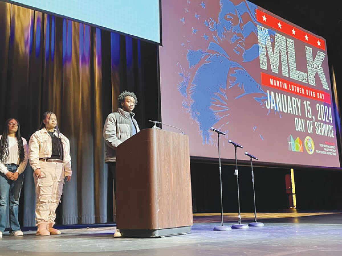  The Black Student Unions of Troy High School and Troy Athens High School gather onstage at a presentation honoring the life of Dr. Martin Luther King Jr. Jan. 15. 