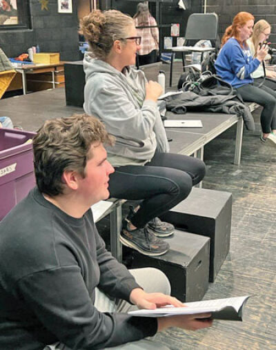  Student director and costume designer Brandon Giliger and theater director Heather McKaig watch as students rehearse a scene in the one act play “Every U.S. Election Ever” at Novi High School Jan. 22.  