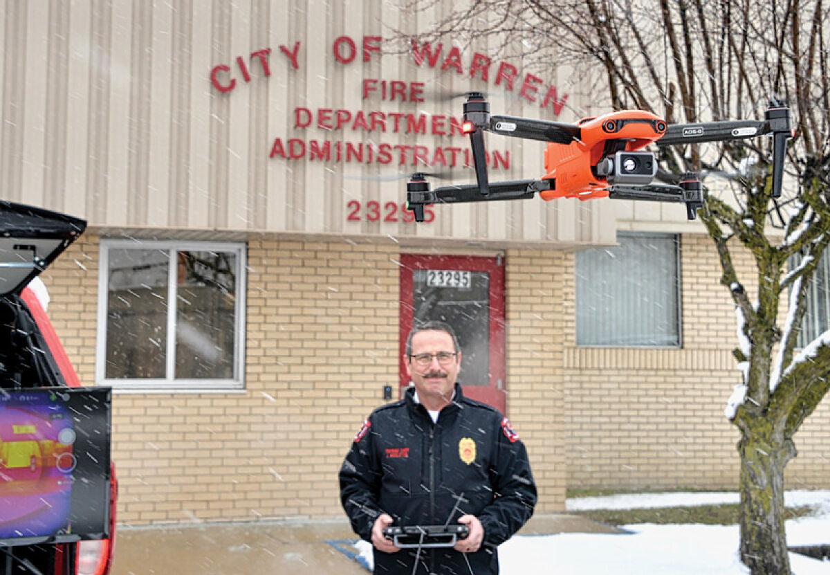  Cold temperatures and snow can reduce the drone’s flying time by more than half as Warren Fire Department Training Chief Jeff Middleton gives a demonstration on Jan. 30.   