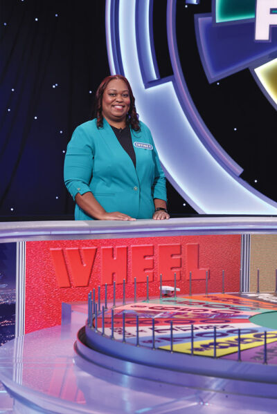  Tiffiney Lee, a fifth grade teacher at Forest Elementary School in Farmington, smiles as she competes in the game show “Wheel of Fortune.”  