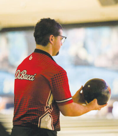  Chippewa Valley senior team captain Owen DiBucci takes a moment before his roll at the Macomb County Bowling Championships on Jan. 13 at 5 Star Lanes. 