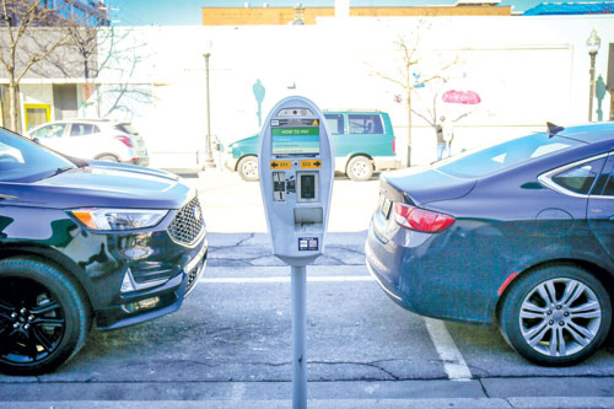  A Sentry parking meter is seen being used by multiple cars on Second Street in Royal Oak last weekend. 