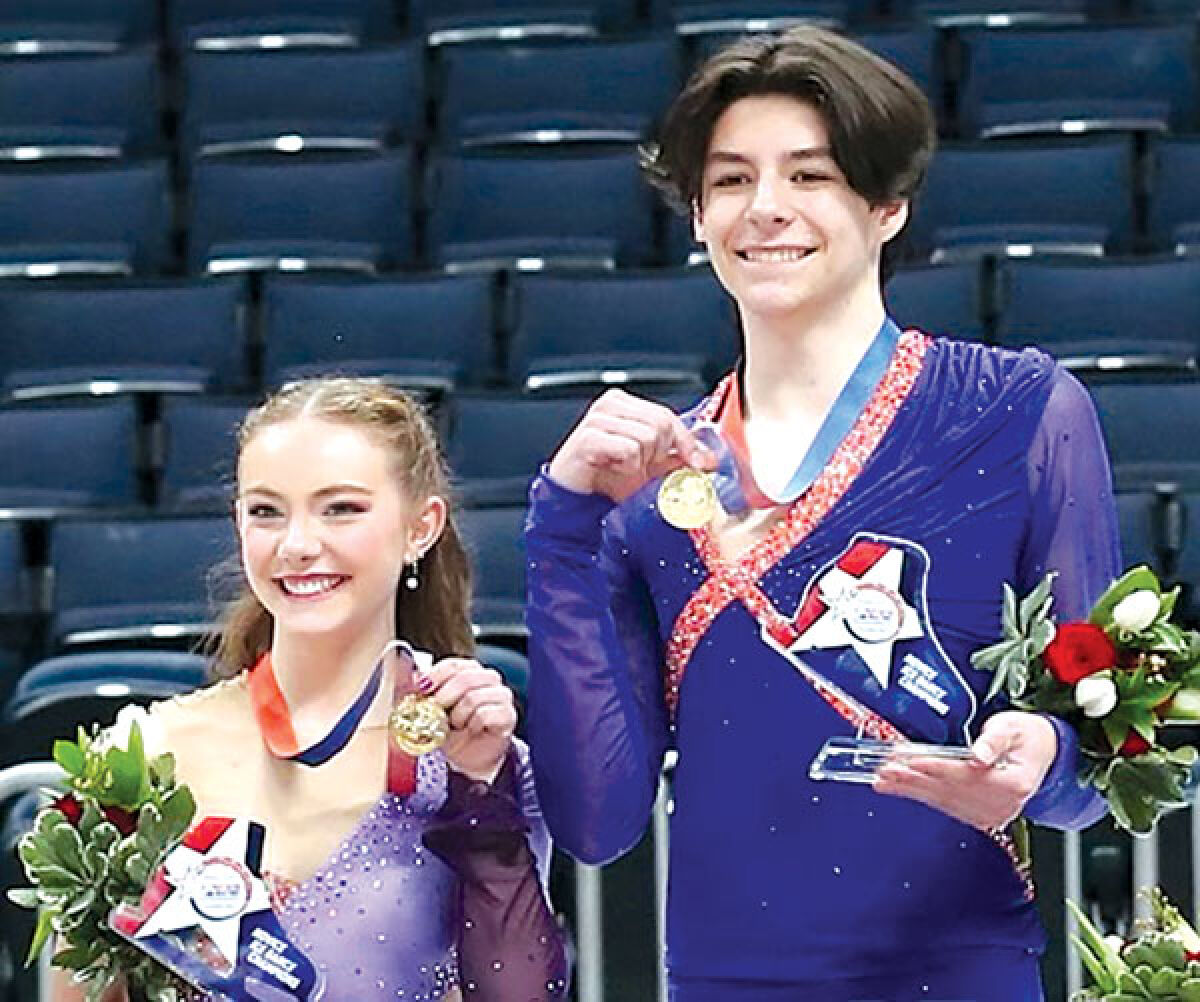  Novice ice dancers Jasmine Robertson,15, and Cooper Cornwell, 16, of Novi, smile as they hold up their gold medals last month after winning the 2024 Prevagen U.S. Figure Skating Championships in Columbus, Ohio. 