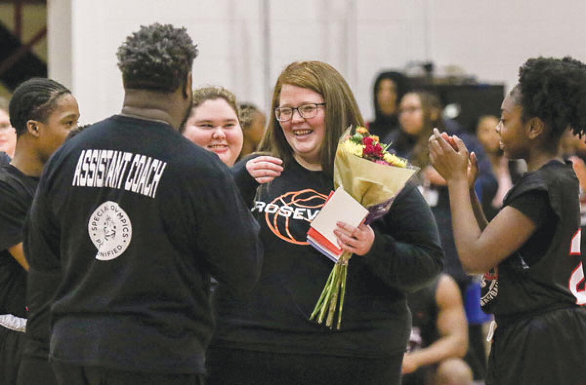  Roseville Unified coach Reba Stanley is recognized for her efforts with the team during halftime of Roseville Unified’s matchup against Sterling Heights Feb. 13. 