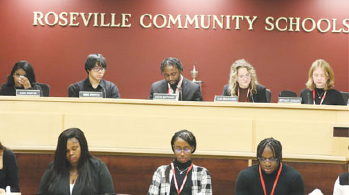  A group of Roseville High School students participate in a mock school board meeting Feb. 12 after spending the day with Roseville Community Schools officials. 