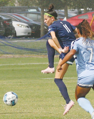  Fifth-year soccer player Haley Iacona set Ave Maria University career records in minutes played (5,382) and games played (76) while also setting a single-season record in minutes played (1,539). Iacona controls the ball during Ave Maria’s Sun Conference Tournament matchup against Keiser University on Nov. 4. 