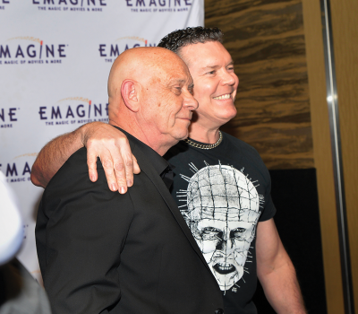   Doug Bradley takes a photo with a fan wearing a shirt that features Bradley’s Pinhead character from the “Hellraiser” movies at the “Thorns” red carpet premiere at Emagine Royal Oak Feb. 17 