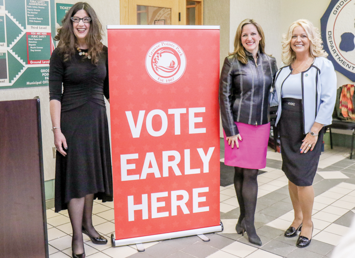  From left, Grosse Pointe Park Mayor Michele Hodges, Michigan Secretary of State Jocelyn Benson and Park City Clerk Bridgette Bowdler mark the start of early voting in Michigan during an event Feb. 15 at Park City Hall, the site of early voting for Park residents. 