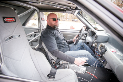  Dave McKenna has a need for speed. His red 1988 Ford Mustang is equipped with a General Motors engine that goes up to 170 mph.  