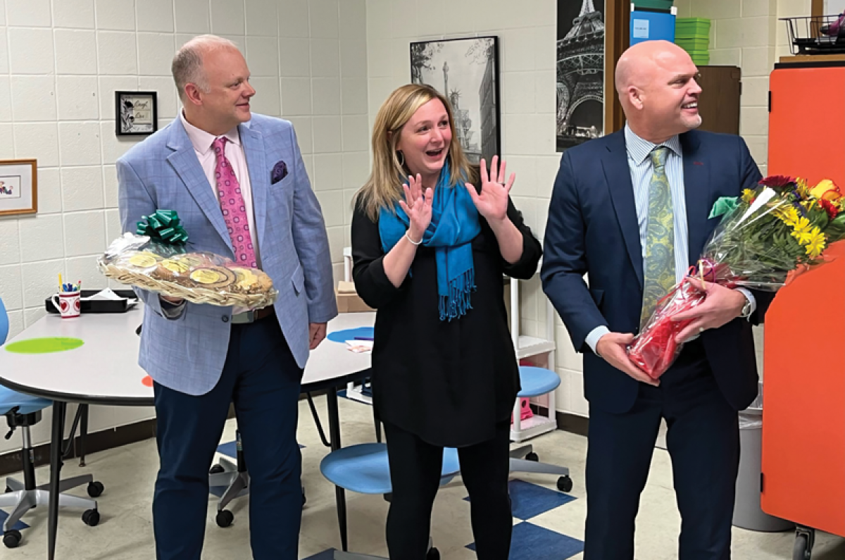  The Middle School Teacher of the Year and the Troy School District’s overall Teacher of the Year was Stephanie Hyska,  center, an English language development teacher at Boulan Park Middle School. 