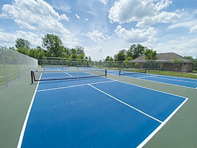   The city of Novi currently has four pickleball courts at Wildlife Woods Park, pictured, and will be doubling the number of pickleball courts at the park this year. The city also will install four pickleball courts at Meadowbrook Commons. 