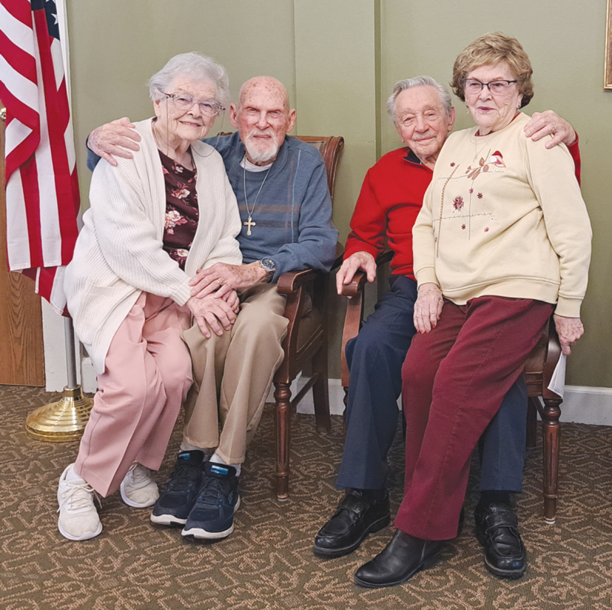  Sisters Joanne Arnold, 95, left, and Janice Randall, 89, sit with their U.S. military veteran husbands Roland Arnold, 97,  and Dick Randall, 95, following a Veterans Day ceremony at Brookdale Senior Living of Novi last November.  